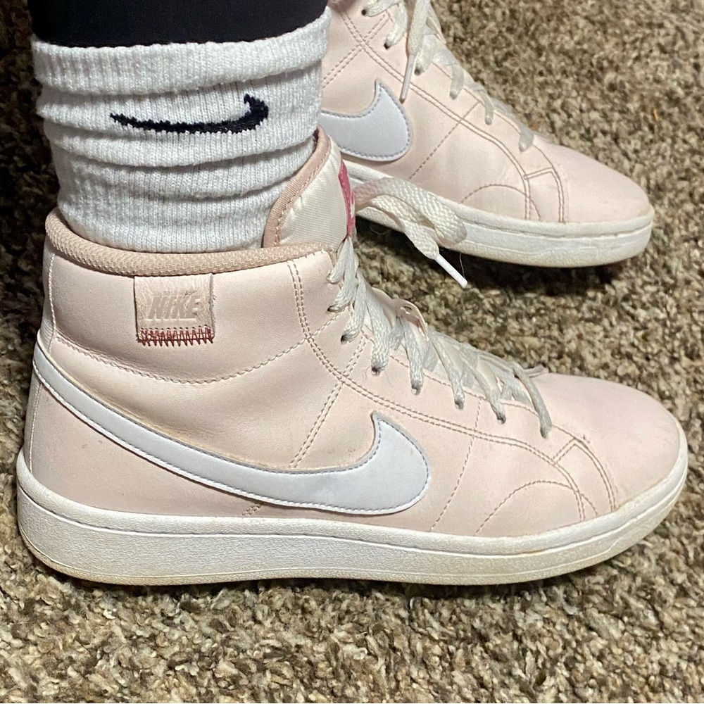 Pink Nike high top shoes